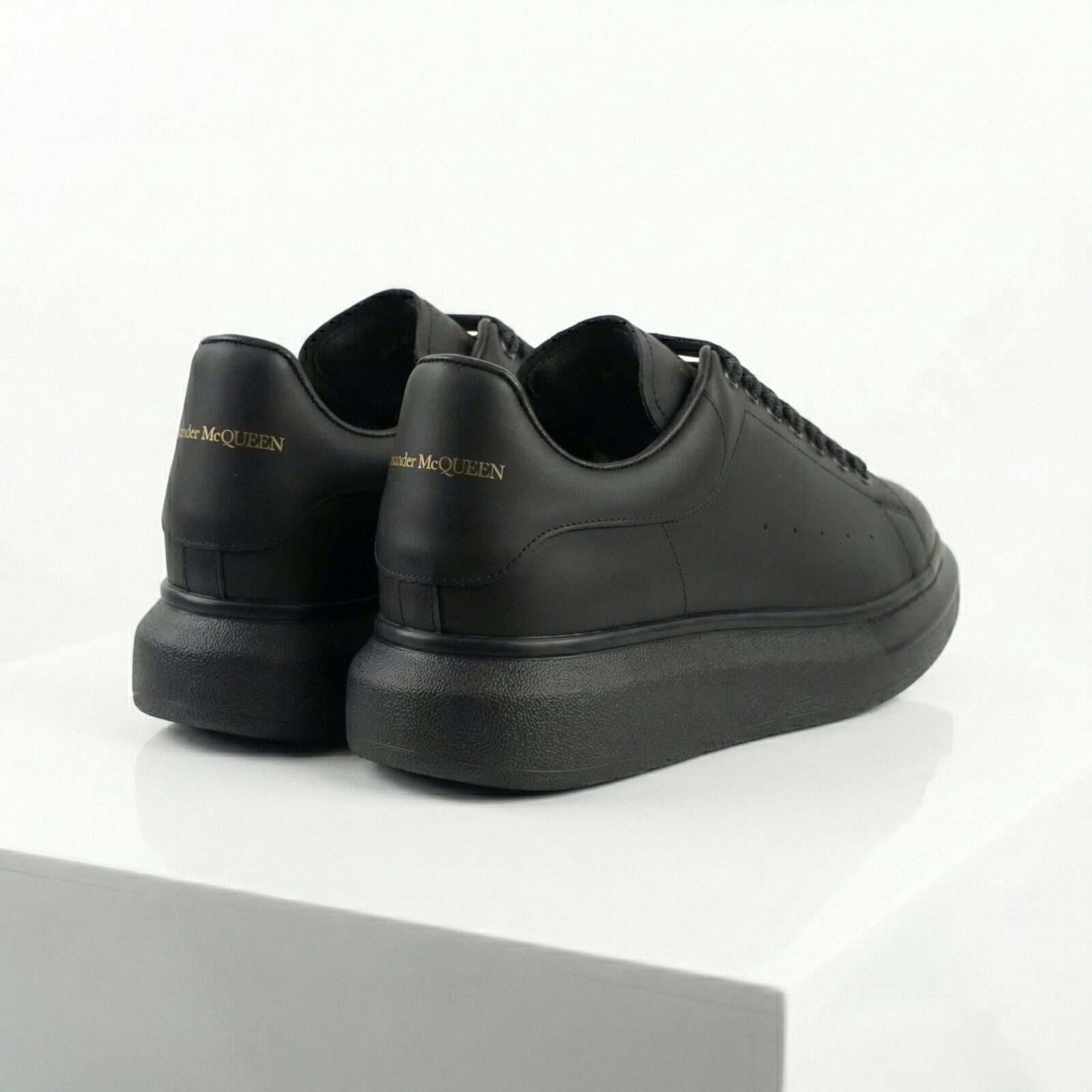 Alexander McQueen Oversized Black Sneakers Back View - SHUZAR Egypt