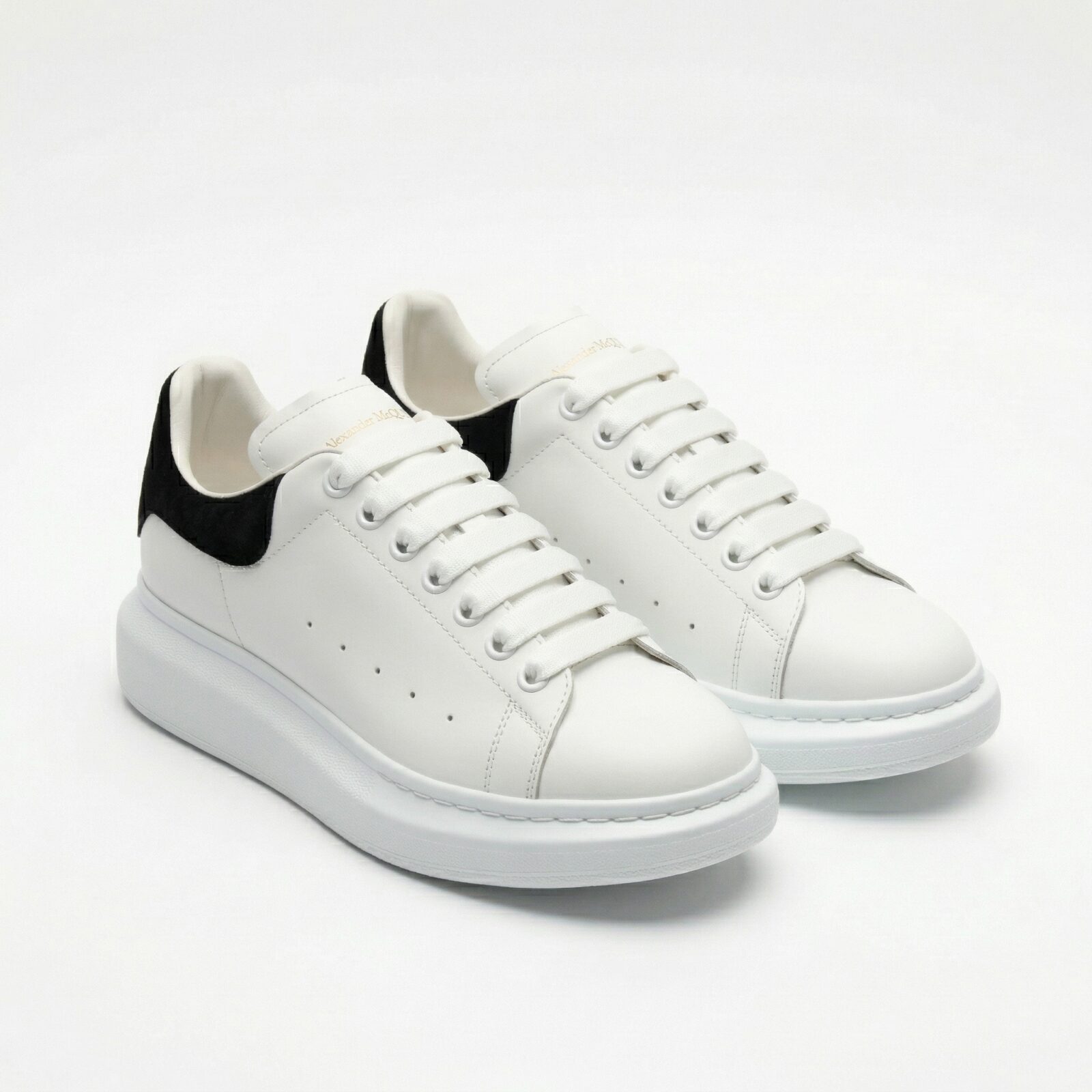 Alexander McQueen Wide Sole Sneakers Front View Pair - SHUZAR Egypt