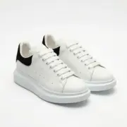Alexander McQueen Wide Sole Sneakers Front View Pair - SHUZAR Egypt