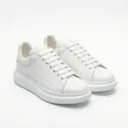 Alexander McQueen Oversized White sneakers front view pair on white background – SHUZAR Egypt