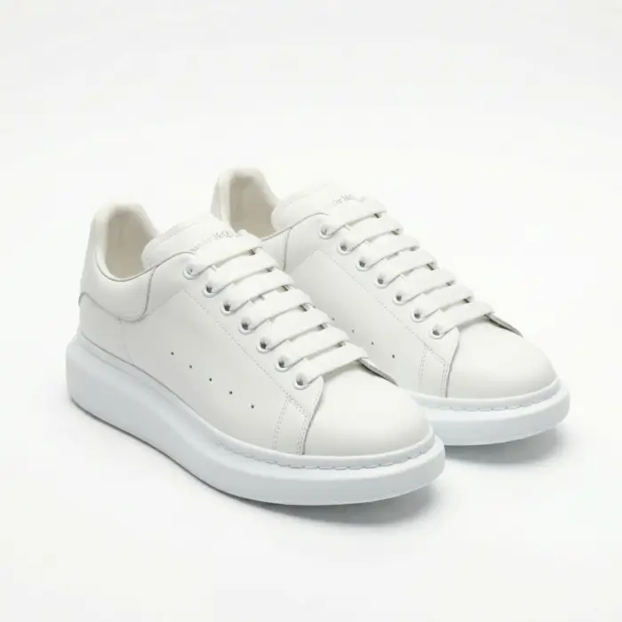 Alexander McQueen Oversized White sneakers front view pair on white background – SHUZAR Egypt