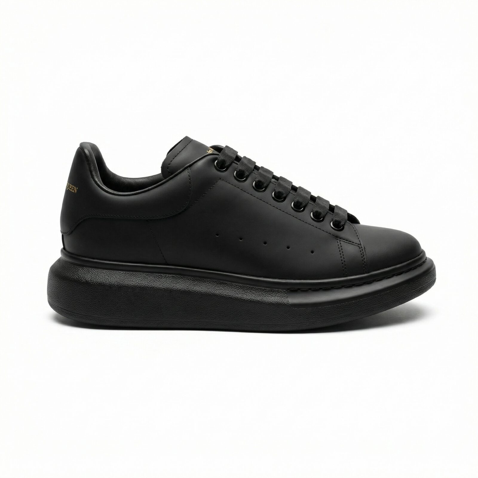 Alexander McQueen Oversized Black Sneakers Side View - SHUZAR Egypt