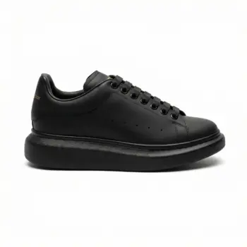 Alexander McQueen Oversized Black Sneakers Side View - SHUZAR Egypt