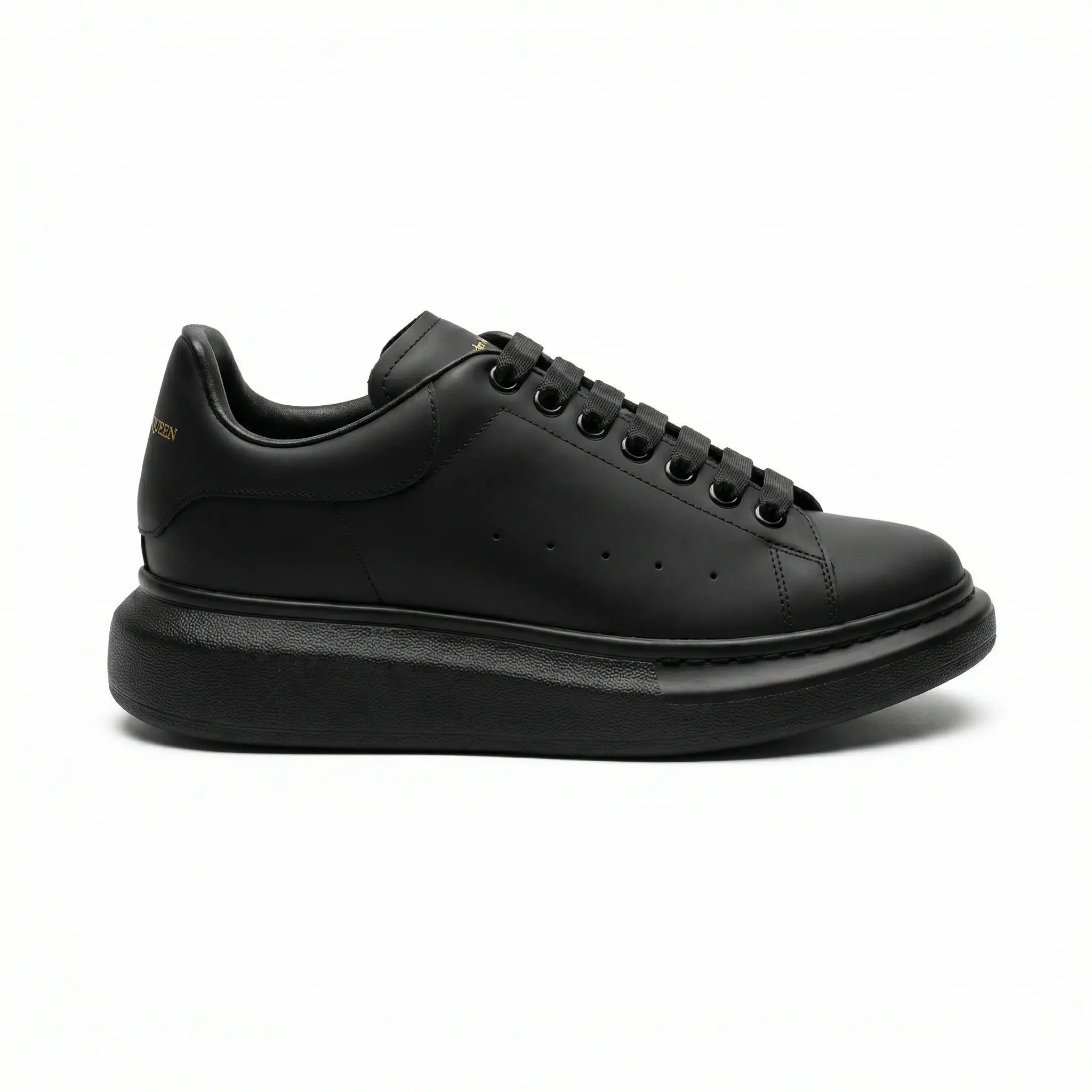 Alexander McQueen Oversized Black Sneakers Side View - SHUZAR Egypt