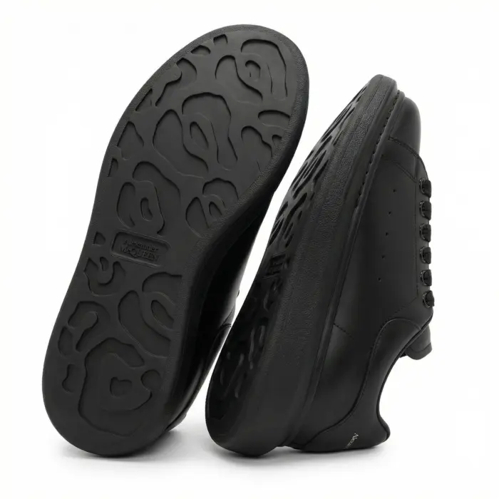 Alexander McQueen Oversized Black Sneakers Sole View - SHUZAR Egypt